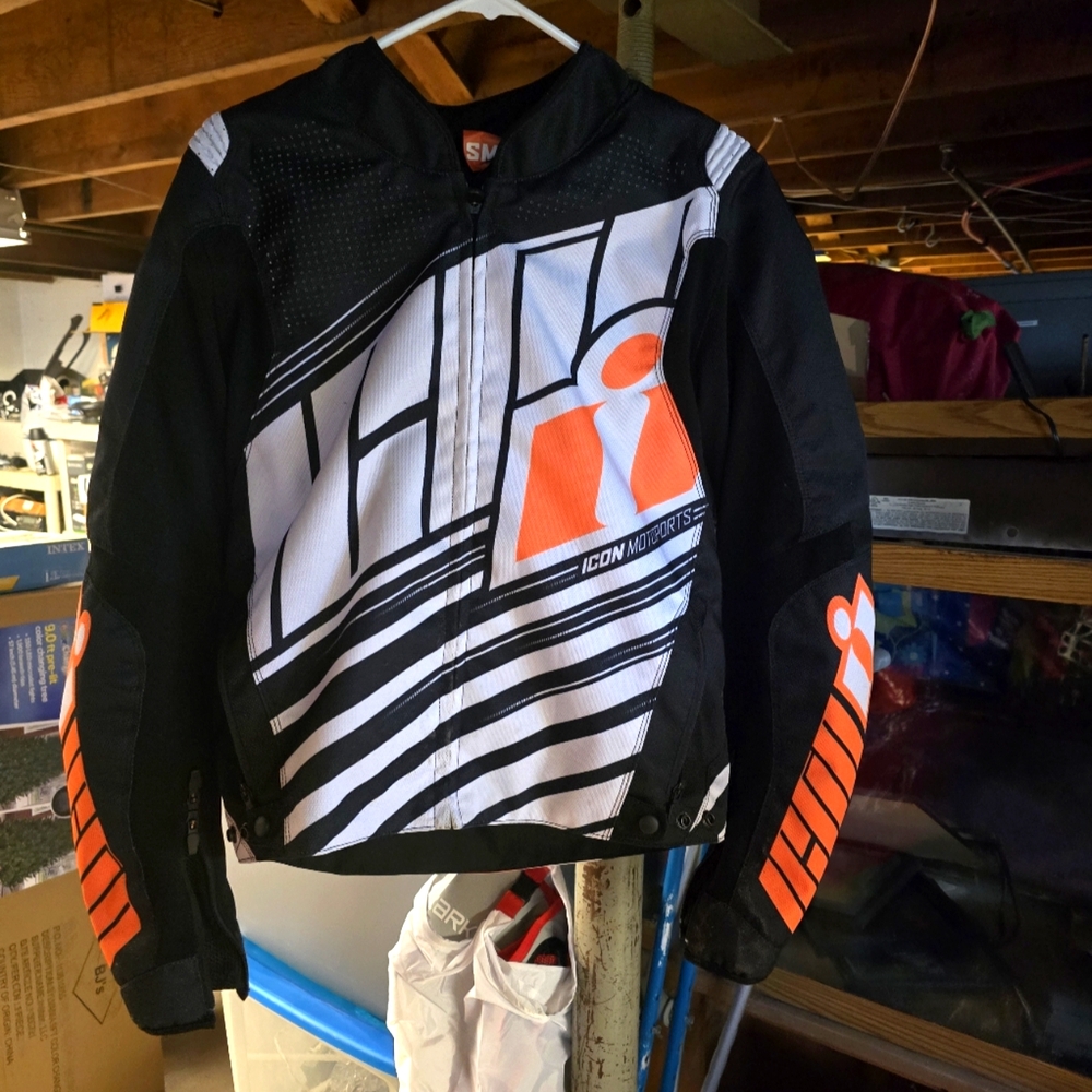 ICON Black and Orange Motorsport Jacket with Angular Stripes